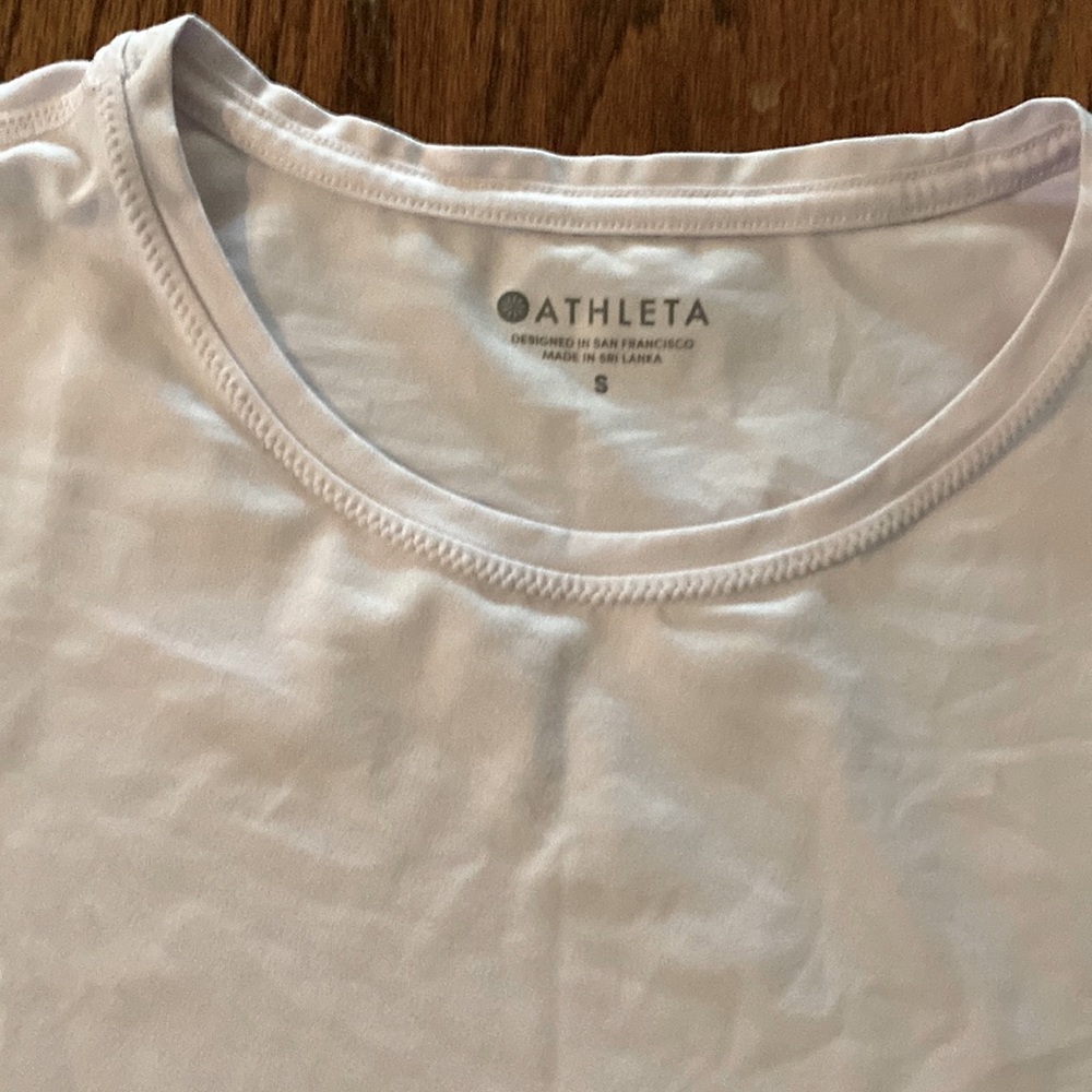 Light lavender color Athleta shirt like new condition